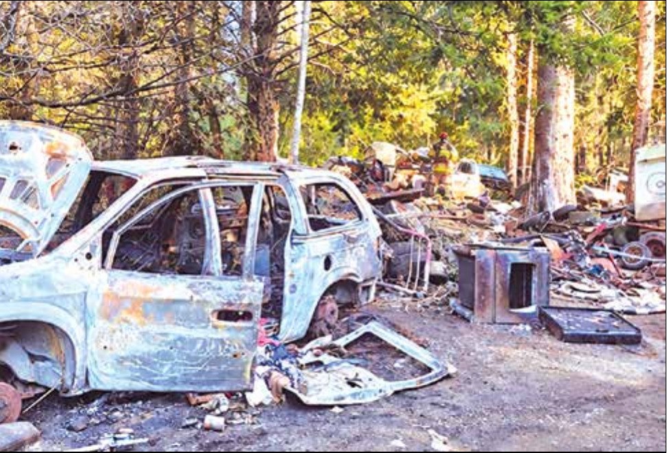 Surrounding the burned trailer is an area that has deteriorated over the years into what resembles an illegal dumping ground.