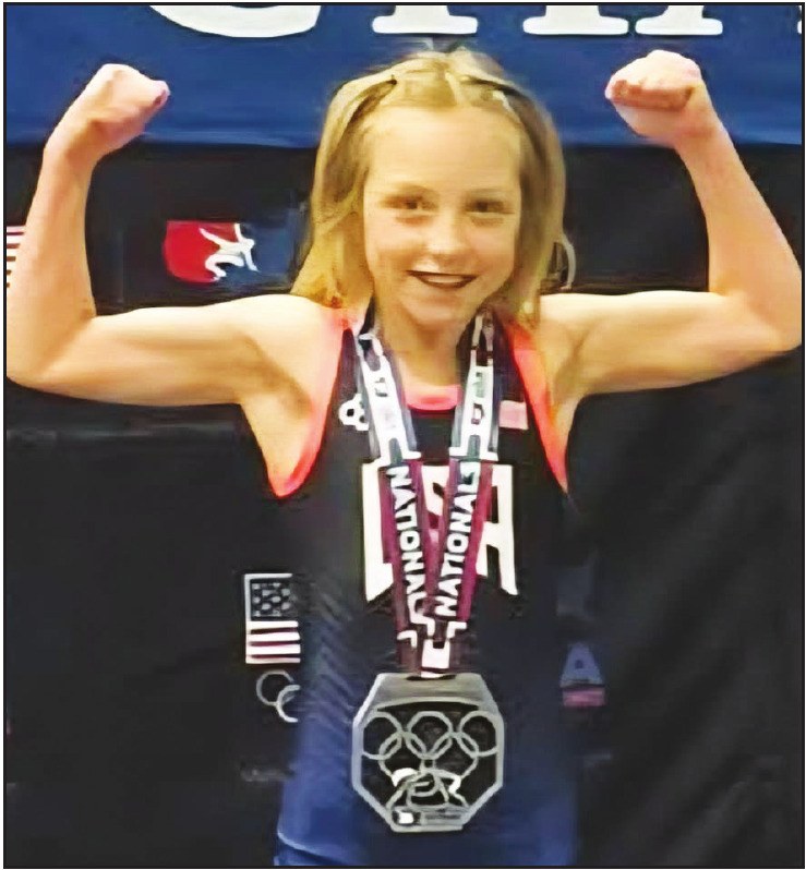 KelleyAnne Bates strikes a pose after earning silver at the 2026 USA Wrestling Women’s National Championships in Spokane, WA.